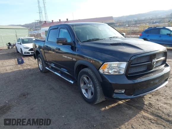 ✅ 2011 Ram 1500 Sport • VIN: 1D7RV1CT8BS590191 • Lot: 43725699. Listed on IAAI with 183,691 mi. Free auction sales archive from the USA and detailed vehicle history report at DreamBid. Image 1.