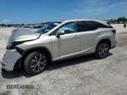 ✅ 2020 Lexus RX 350L • VIN: JTJHZKEA1L2017739 • Lot: 65697825. Listed on Copart with 33,413 mi. Free auction sales archive from the USA and detailed vehicle history report at DreamBid. Image 1.