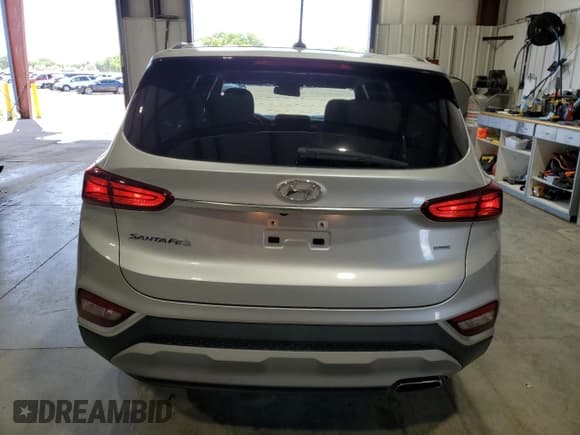 ✅ 2019 Hyundai Santa Fe SE • VIN: 5NMS2CAD1KH098867 • Lot: 57356094. Wystawiony na Copart z przebiegiem 51 447 mil. Bezpłatny archiwum sprzedaży aukcyjnych z USA i szczegółowy raport historii pojazdu na DreamBid. Zdjęcie 6.