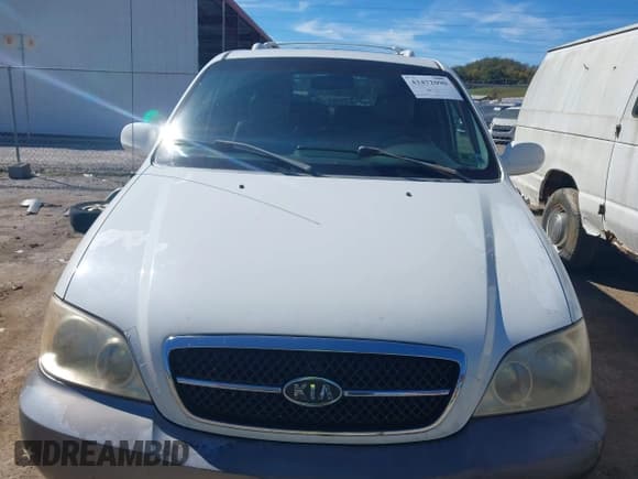 ✅ 2004 Kia Sedona LX • VIN: KNDUP131046552799 • Lot: 43472090. Listed on IAAI with 283,684 mi. Free auction sales archive from the USA and detailed vehicle history report at DreamBid. Image 13.