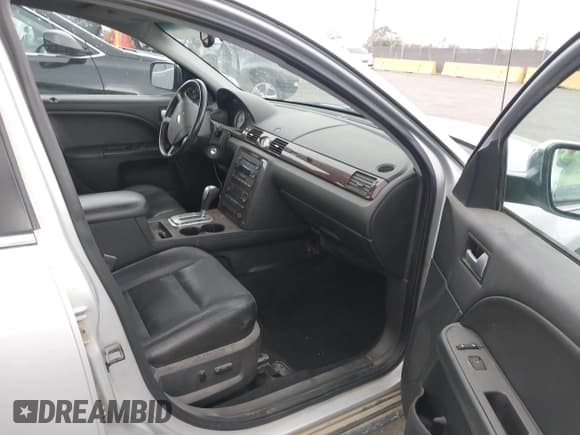 ✅ 2005 Ford Five Hundred Limited • VIN: 1FAHP25185G103859 • Лот: 43285092. Опубликован ранее на IAAI с пробегом 104 084 миль. Бесплатный доступ к архиву аукционных продаж из США и подробный отчёт об истории автомобиля на DreamBid. Изображение 5.