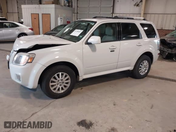 ✅ 2010 Mercury Mariner Premier • VIN: 4M2CN8HGXAKJ00279 • Lot: 41748487. Listed on IAAI with 116,565 mi. Free auction sales archive from the USA and detailed vehicle history report at DreamBid. Image 17.