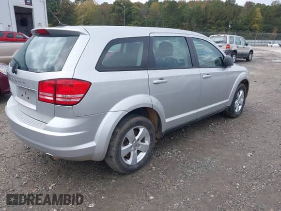 2013 Dodge Journey American Value с VIN 3C4PDCAB2DT557862, выставлен на аукционе IAAI как лот 43455714 с пробегом 188 665 миль миль и . История ставок и продаж доступна на DreamBid. Изображение 4.