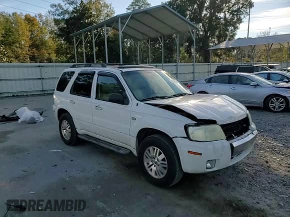 2006 Mercury Mariner Luxury с VIN 4M2CU56176DJ03331, выставлен на аукционе Copart как лот 83557274 с пробегом 291 468 миль миль и Списание • Salvage title. История ставок и продаж доступна на DreamBid. Изображение 12.