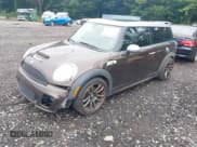 ✅ 2009 MINI Clubman S • VIN: WMWMM33569TP89990 • Lot: 42869350. Listed on IAAI with 94,090 mi. Free auction sales archive from the USA and detailed vehicle history report at DreamBid. Image 2.