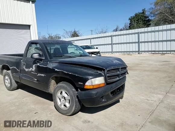2000 Dodge Dakota z VIN 1B7FL26P6YS582901, wystawiony jako Copart lot #49786315 z przebiegiem 165 727 mil mil oraz Szkoda całkowita • Salvage title. Historia ofert i sprzedaży dostępna na DreamBid. Obrazek 11.