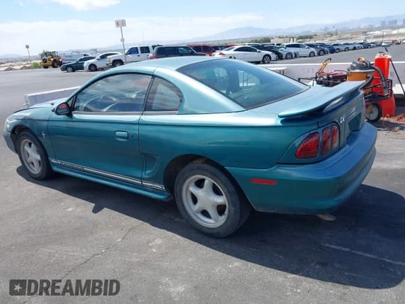 ✅ 1997 Ford Mustang • VIN: 1FALP4049VF200422 • Lot: 42073947. Listed on IAAI with 157,937 mi. Free auction sales archive from the USA and detailed vehicle history report at DreamBid. Image 3.