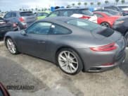 ✅ 2017 Porsche 911 Carrera • VIN: WP0AA2A93HS107859 • Лот: 74300154. Опубликован ранее на Copart с пробегом Не указан. Бесплатный доступ к архиву аукционных продаж из США и подробный отчёт об истории автомобиля на DreamBid. Изображение 2.