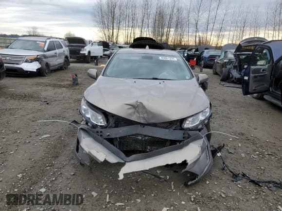 ✅ 2017 Chevrolet Volt LT • VIN: 1G1RC6S58HU189987 • Lot: 83861334. Wystawiony na Copart z przebiegiem 77 285 mil. Bezpłatny archiwum sprzedaży aukcyjnych z USA i szczegółowy raport historii pojazdu na DreamBid. Zdjęcie 5.