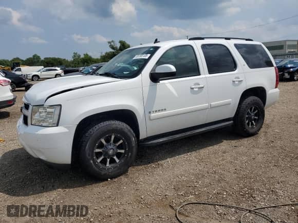 2007 Chevrolet Tahoe LTZ с VIN 1GNFK13097J255473, выставлен на аукционе Copart как лот 68166135 с пробегом 168 573 миль миль и Списание • Salvage title. История ставок и продаж доступна на DreamBid. Изображение 1.