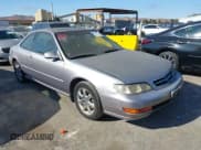 ✅ 1998 Acura CL Premium • VIN: 19UYA2256WL009251 • Lot: 43149141. Listed on IAAI with 176,424 mi. Free auction sales archive from the USA and detailed vehicle history report at DreamBid. Image 1.