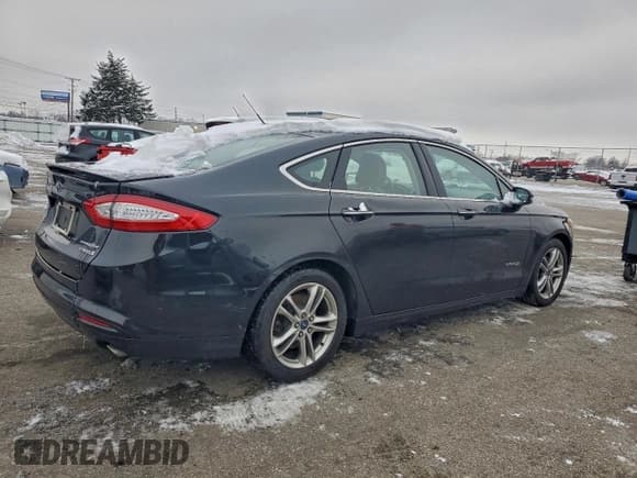✅ 2015 Ford Fusion Titanium Hybrid • VIN: 3FA6P0RU6FR179817 • Lot: 95251945. Wystawiony na Copart z przebiegiem 115 636 mil. Bezpłatny archiwum sprzedaży aukcyjnych z USA i szczegółowy raport historii pojazdu na DreamBid. Zdjęcie 3.