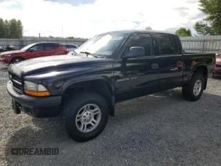 ✅ 2002 Dodge Dakota Sport • VIN: 1B7HG38N22S644784 • Lot: 64881065. Wystawiony na Copart z przebiegiem 218 618 mil. Bezpłatny archiwum sprzedaży aukcyjnych z USA i szczegółowy raport historii pojazdu na DreamBid. Zdjęcie 1.