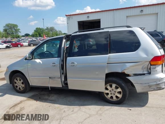 ✅ 2002 Honda Odyssey EX-L • VIN: 2HKRL18032H504640 • Lot: 42647259. Listed on IAAI with Not provided. Free auction sales archive from the USA and detailed vehicle history report at DreamBid. Image 13.