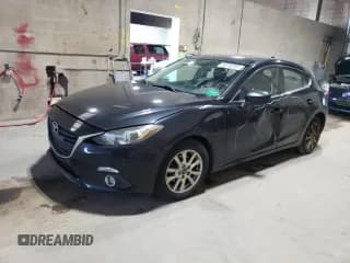 ✅ 2014 Mazda 3 i Grand Touring • VIN: JM1BM1M79E1132637 • Лот: 85576255. Опубликован ранее на Copart с пробегом 135 660 миль. Бесплатный доступ к архиву аукционных продаж из США и подробный отчёт об истории автомобиля на DreamBid. Изображение 1.