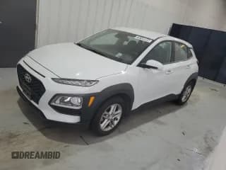 ✅ 2019 Hyundai Kona SE • VIN: KM8K12AA2KU332988 • Лот: 76169994. Опубликован ранее на Copart с пробегом 79 545 миль. Бесплатный доступ к архиву аукционных продаж из США и подробный отчёт об истории автомобиля на DreamBid. Изображение 1.