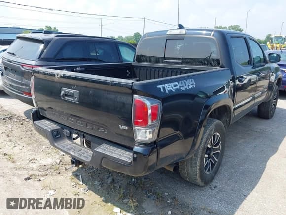 ✅ 2021 Toyota Tacoma SR • VIN: 3TMCZ5AN1MM404910 • Lot: 42653848. Wystawiony na IAAI z przebiegiem 83 201 mil. Bezpłatny archiwum sprzedaży aukcyjnych z USA i szczegółowy raport historii pojazdu na DreamBid. Zdjęcie 4.