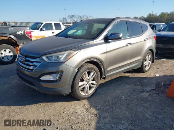 ✅ 2014 Hyundai Santa Fe • VIN: 5XYZW3LAXEG140795 • Лот: 43650491. Опубликован ранее на IAAI с пробегом 166 910 миль. Бесплатный доступ к архиву аукционных продаж из США и подробный отчёт об истории автомобиля на DreamBid. Изображение 18.