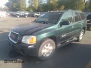 ✅ 2005 GMC Envoy SLE • VIN: 1GKDT13S352354641 • Lot: 31188420. Listed on IAAI with Not provided. Free auction sales archive from the USA and detailed vehicle history report at DreamBid. Image 2.
