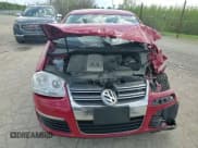 ✅ 2009 Volkswagen Jetta SE • VIN: 3VWRZ71K29M099711 • Lot: 54612375. Listed on Copart with 115,899 mi. Free auction sales archive from the USA and detailed vehicle history report at DreamBid. Image 14.