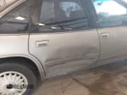 ✅ 1996 Buick Regal Custom • VIN: 2G4WB52M2T1462761 • Lot: 42483788. Listed on IAAI with 156,925 mi. Free auction sales archive from the USA and detailed vehicle history report at DreamBid. Image 6.