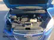 2015 Chevrolet Trax LS z VIN KL7CJKSB0FB246836, wystawiony jako Copart lot #82005255 z przebiegiem 105 912 mil mil oraz Szkoda całkowita • Salvage title. Historia ofert i sprzedaży dostępna na DreamBid. Obrazek 12.