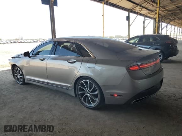 ✅ 2019 Lincoln MKZ Hybrid Reserve I • VIN: 3LN6L5LU0KR629561 • Lot: 82274315. Wystawiony na Copart z przebiegiem 25 910 mil. Bezpłatny archiwum sprzedaży aukcyjnych z USA i szczegółowy raport historii pojazdu na DreamBid. Zdjęcie 2.
