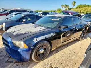 2014 Dodge Charger Police with VIN 2C3CDXAT0EH150748, listed as a Copart auction lot 68453915 with 188,820 mi miles and Salvage title. Bid and sale history available at DreamBid. Image 1.