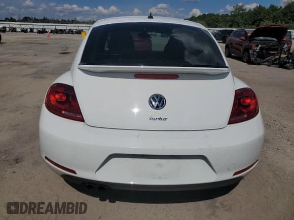 ✅ 2016 Volkswagen Beetle S • VIN: 3VWF07AT2GM611941 • Lot: 80657125. Listed on Copart with 74,121 mi. Free auction sales archive from the USA and detailed vehicle history report at DreamBid. Image 6.