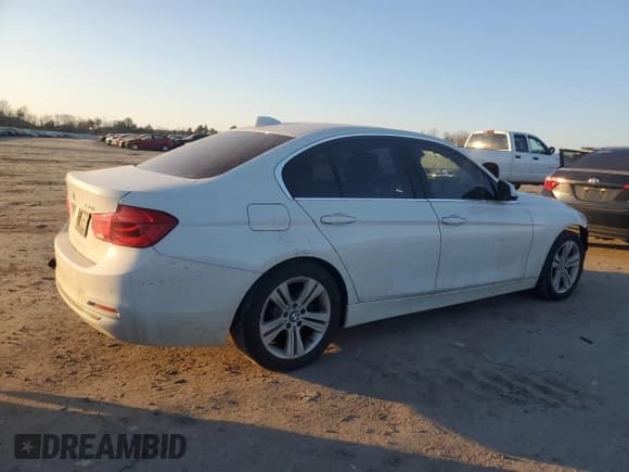 ✅ 2018 BMW 3 Series 330i • VIN: WBA8B9G56JNU97771 • Lot: 54126505. Listed on Copart with 71,545 mi. Free auction sales archive from the USA and detailed vehicle history report at DreamBid. Image 3.