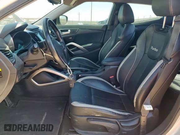 2015 Hyundai Veloster Turbo R-Spec z VIN KMHTC6AE5FU237176, wystawiony jako Copart lot #60752925 z przebiegiem 80 702 mil mil oraz Szkoda całkowita • Salvage title. Historia ofert i sprzedaży dostępna na DreamBid. Obrazek 7.