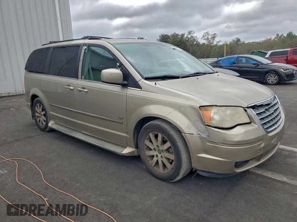 ✅ 2009 Chrysler Town & Country Touring • VIN: 2A8HR54199R632922 • Лот: 94696365. Опубликован ранее на Copart с пробегом Не указан. Бесплатный доступ к архиву аукционных продаж из США и подробный отчёт об истории автомобиля на DreamBid. Изображение 4.
