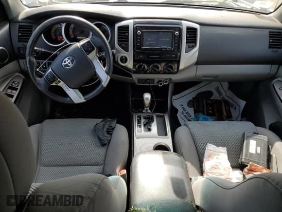 ✅ 2015 Toyota Tacoma • VIN: 3TMLU4EN0FM205580 • Lot: 85667644. Listed on Copart with 60,806 mi. Free auction sales archive from the USA and detailed vehicle history report at DreamBid. Image 8.