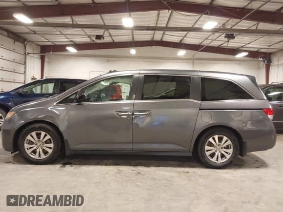 ✅ 2014 Honda Odyssey EX-L • VIN: 5FNRL5H60EB034923 • Lot: 43637432. Wystawiony na IAAI z przebiegiem 148 620 mil. Bezpłatny archiwum sprzedaży aukcyjnych z USA i szczegółowy raport historii pojazdu na DreamBid. Zdjęcie 14.