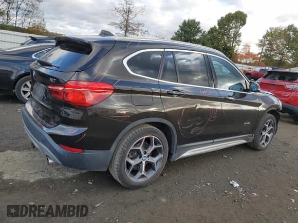 ✅ 2018 BMW X1 xDrive28i • VIN: WBXHT3C35J5L26773 • Lot: 82488055. Listed on Copart with 149,115 mi. Free auction sales archive from the USA and detailed vehicle history report at DreamBid. Image 3.