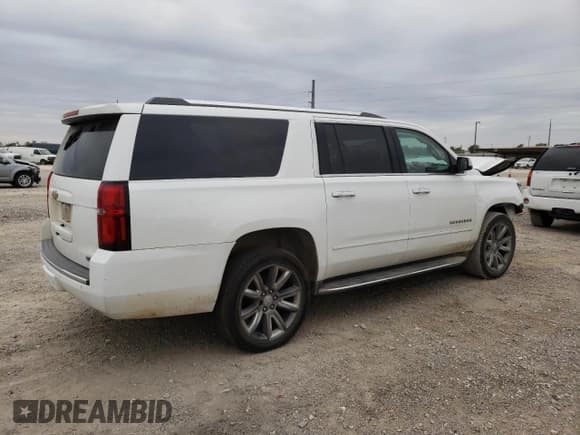 ✅ 2017 Chevrolet Suburban Premier • VIN: 1GNSCJKC1HR383815 • Lot: 75526494. Wystawiony na Copart z przebiegiem 124 147 mil. Bezpłatny archiwum sprzedaży aukcyjnych z USA i szczegółowy raport historii pojazdu na DreamBid. Zdjęcie 3.