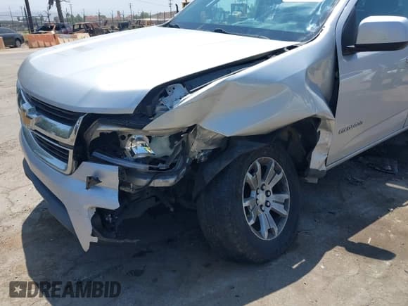 ✅ 2020 Chevrolet Colorado 2WD LT • VIN: 1GCGSCEN9L1171052 • Lot: 42492772. Listed on IAAI with 140,398 mi. Free auction sales archive from the USA and detailed vehicle history report at DreamBid. Image 6.