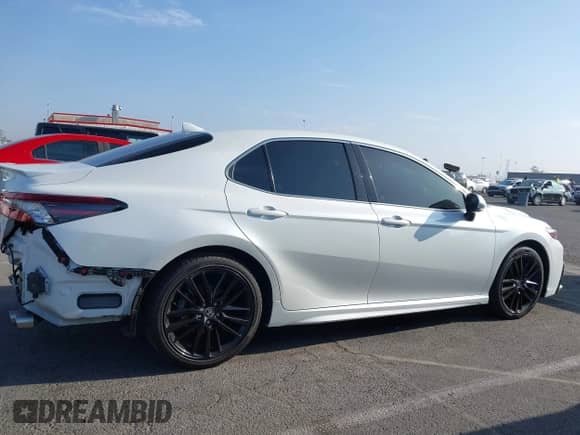 2021 Toyota Camry XSE z VIN 4T1K61AK4MU438222, wystawiony jako IAAI lot #43237160 z przebiegiem 49 103 mil mil oraz . Historia ofert i sprzedaży dostępna na DreamBid. Obrazek 14.