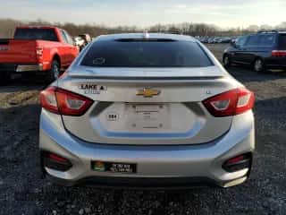 2017 Chevrolet Cruze LT z VIN 1G1BE5SM1H7275542, wystawiony jako Copart lot #69944992 z przebiegiem 66 635 mil mil oraz . Historia ofert i sprzedaży dostępna na DreamBid. Obrazek 6.