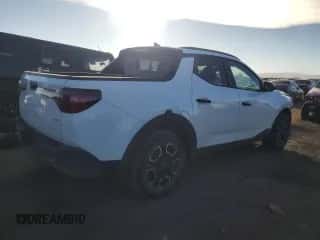 2022 Hyundai Santa Cruz SEL с VIN 5NTJCDAE9NH029585, выставлен на аукционе Copart как лот 81641264 с пробегом 33 563 миль миль и Списание • Salvage title. История ставок и продаж доступна на DreamBid. Изображение 3.