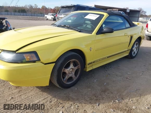 ✅ 2003 Ford Mustang Deluxe • VIN: 1FAFP44433F383417 • Lot: 43673593. Listed on IAAI with 40,754 mi. Free auction sales archive from the USA and detailed vehicle history report at DreamBid. Image 2.