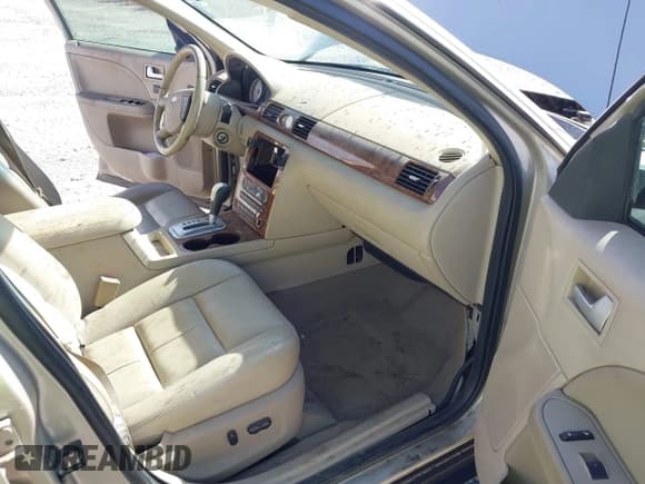 ✅ 2005 Ford Five Hundred Limited • VIN: 1FAFP25115G130702 • Lot: 43770339. Listed on IAAI with 198,783 mi. Free auction sales archive from the USA and detailed vehicle history report at DreamBid. Image 5.