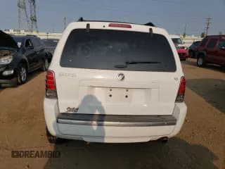 ✅ 2007 Mercury Mariner Luxury • VIN: 4M2YU81147KJ08451 • Лот: 70285654. Опубликован ранее на Copart с пробегом 126 272 миль. Бесплатный доступ к архиву аукционных продаж из США и подробный отчёт об истории автомобиля на DreamBid. Изображение 6.