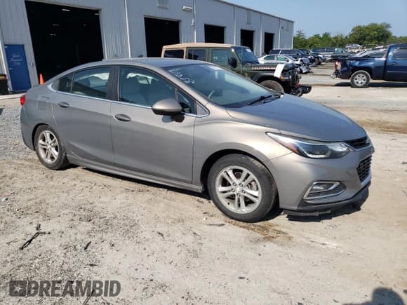 ✅ 2017 Chevrolet Cruze LT • VIN: 1G1BE5SM5H7280260 • Lot: 60887773. Listed on Copart with 77,048 mi. Free auction sales archive from the USA and detailed vehicle history report at DreamBid. Image 4.