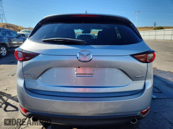 ✅ 2020 Mazda CX-5 Touring • VIN: JM3KFBCM8L1810080 • Lot: 90259945. Wystawiony na Copart z przebiegiem 57 139 mil. Bezpłatny archiwum sprzedaży aukcyjnych z USA i szczegółowy raport historii pojazdu na DreamBid. Zdjęcie 6.