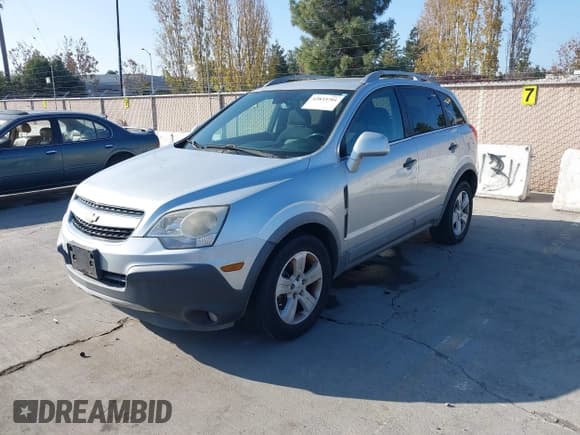 ✅ 2013 Chevrolet Captiva Sport LS • VIN: 3GNAL2EK0DS574766 • Лот: 43833701. Опубликован ранее на IAAI с пробегом 298 628 миль. Бесплатный доступ к архиву аукционных продаж из США и подробный отчёт об истории автомобиля на DreamBid. Изображение 2.