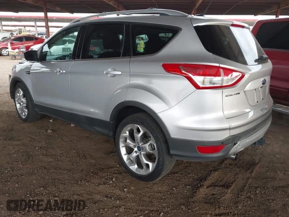 ✅ 2013 Ford Escape Titanium • VIN: 1FMCU0J92DUB64035 • Lot: 42023748. Listed on IAAI with 177,636 mi. Free auction sales archive from the USA and detailed vehicle history report at DreamBid. Image 3.