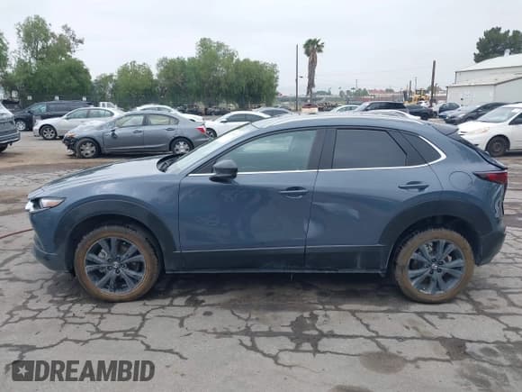✅ 2022 Mazda CX-30 S Carbon Edition • VIN: 3MVDMBCL0NM456154 • Lot: 42153202. Listed on IAAI with 40,372 mi. Free auction sales archive from the USA and detailed vehicle history report at DreamBid. Image 14.