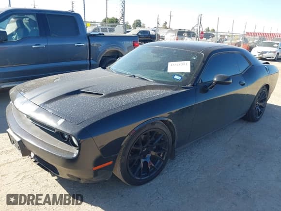 ✅ 2015 Dodge Challenger SXT • VIN: 2C3CDZAG6FH869048 • Lot: 43321252. Listed on IAAI with 95,717 mi. Free auction sales archive from the USA and detailed vehicle history report at DreamBid. Image 2.