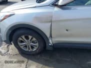 ✅ 2014 Hyundai Santa Fe • VIN: 5XYZU3LB7EG205102 • Lot: 43657537. Wystawiony na IAAI z przebiegiem 142 689 mil. Bezpłatny archiwum sprzedaży aukcyjnych z USA i szczegółowy raport historii pojazdu na DreamBid. Zdjęcie 12.